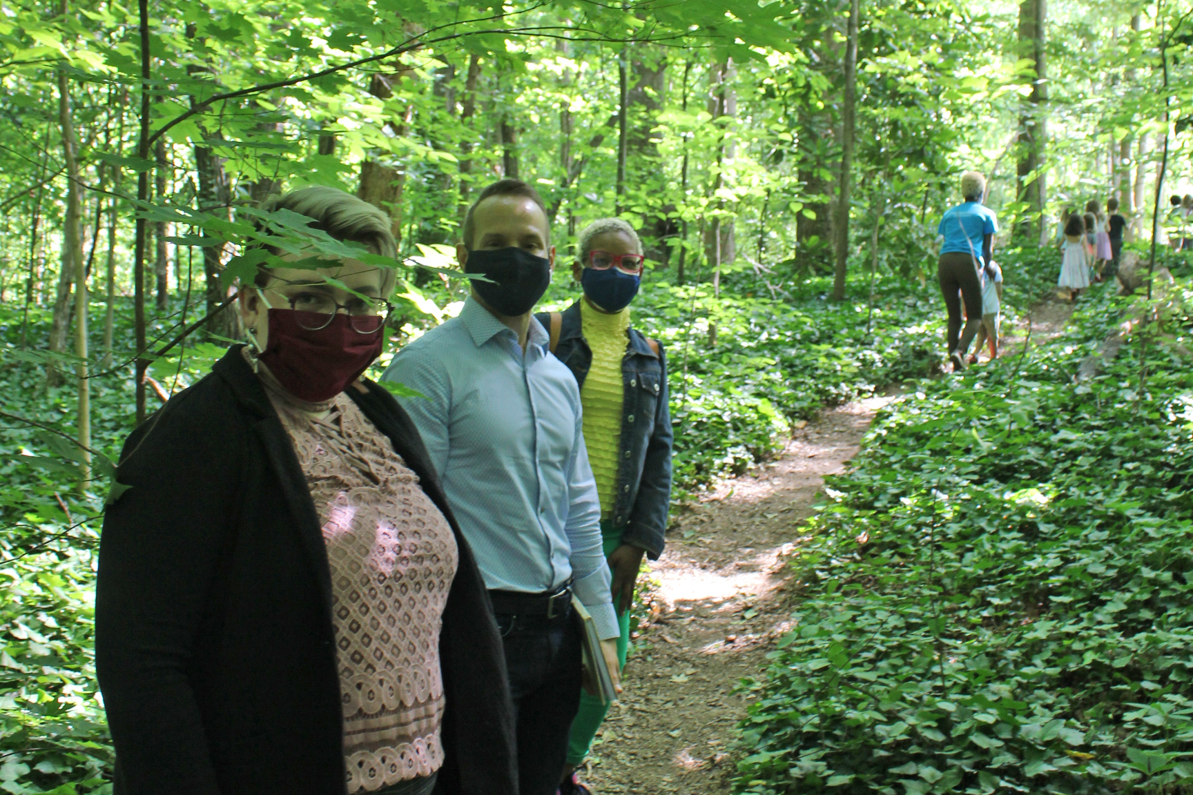 Dr. Gary Bingham (middle) and his team of GSU graduate students observing a Pre-K classroom in the forest