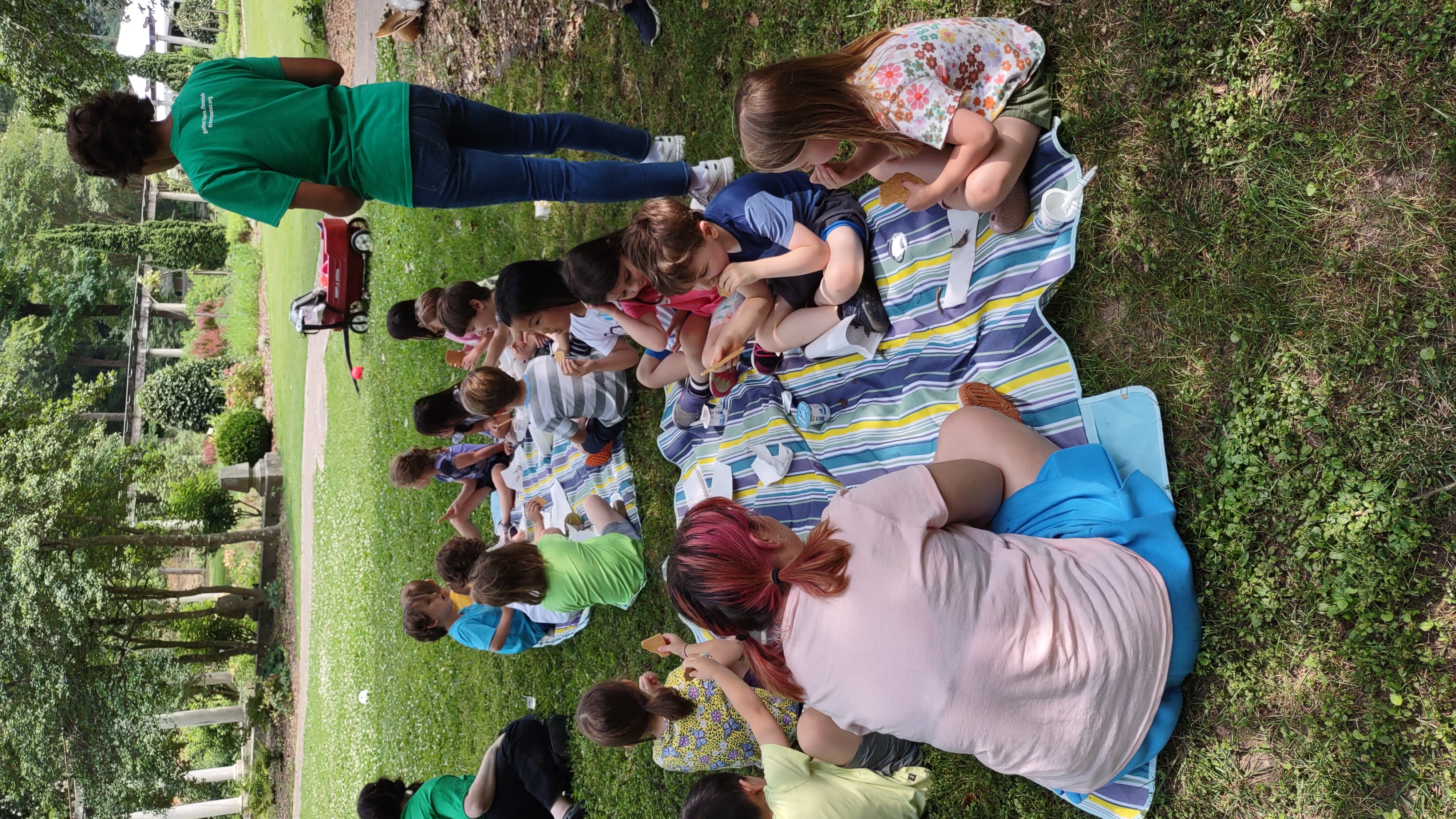 Campers having a picnic lunch in Cator Woolford Gardens.