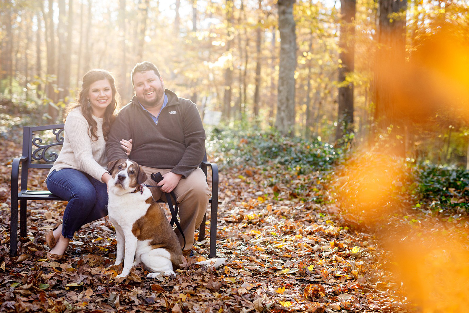 Meredith & Patrick Gray with their beloved dog Bernie, posing for their engagement photos in Frazer Forest in 2018.